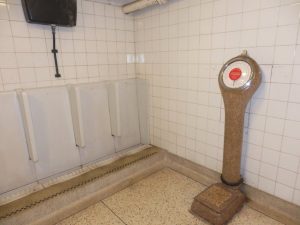 Down the Toilet or Scales of Justice
